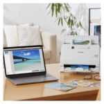 Escáner Canon RS40 alimentado con hojas, resolución de 600 x 600 DPI, color blanco, SKU 5209C003