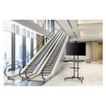 Carro para TV de 32 a 70 pulgadas Neomounts, modelo PLASMA-M1700E, con ajuste de altura y ruedas para movilidad.