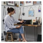 Impresora multifunción Epson EcoTank ET-8550 a color con sistema de tanques de tinta, SKU C11CJ21401. Alta calidad de impresión y eficiencia en el uso de tinta.