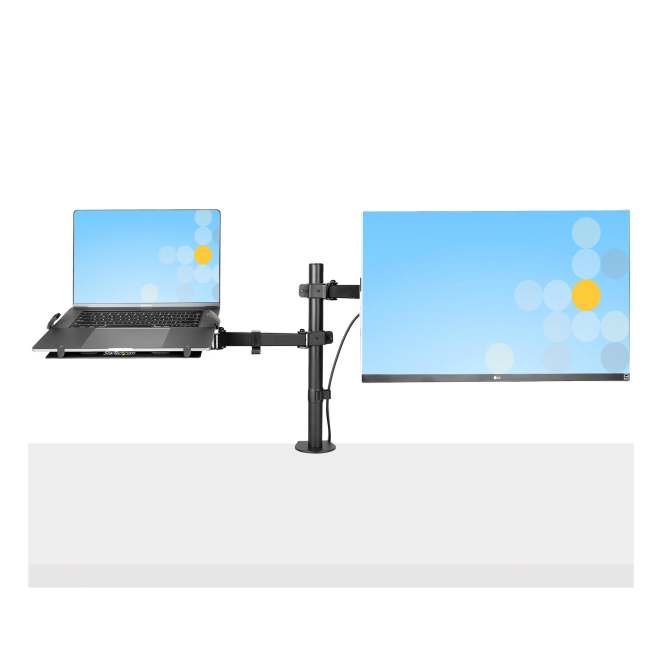 StarTech.com Brazo Soporte Ajustable para Monitor con Bandeja VESA para un Ordenador Portátil de 4,5kg y una Pantalla de hasta 32″ (8kg), Negro, con Mordaza en C/Grommet 4 Brazo soporte ajustable StarTech.com en uso