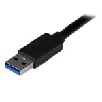 Imagen del adaptador de vídeo externo StarTech USB 3.0 a HDMI. Incluye hub USB de 1 puerto y permite resoluciones de hasta 1080p. SKU USB32HDEH.